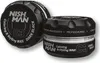 Two jars of Nishman hair coloring wax are shown against a white background. One jar is in the foreground, slightly angled, and the other is in the background, also angled. Produktbild-Vorschau