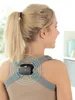 A woman wearing a posture corrector device on her back. Podgląd zdjęcia produktu