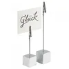 Two silver cube-shaped card holders with clips, one holding a white card with the word "Glück" written in black script. Produktbild-Vorschau