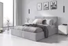 A modern bedroom with a gray upholstered bed as the main focus. Produktbild-Vorschau