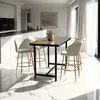 A modern kitchen or dining area with a bar table and stools. Produktbild-Vorschau