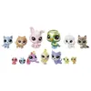 A collection of small, stylized toy animal figures. Podgląd zdjęcia produktu