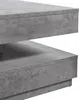 A close-up view of a modern coffee table with a concrete-like finish. Náhled obrázku produktu