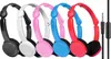 A row of five colorful headphones on a white background. Podgląd zdjęcia produktu
