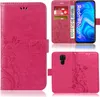 A collage of images showing a pink phone case with a floral design, some cards and banknotes inserted into it, and a phone inside. Produktbild-Vorschau