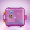 A small, purple, glittery, cube-shaped toy with stickers of a paw print, a musical note with wings, and a bone. It has yellow and pink connectors on the side. Náhled obrázku produktu
