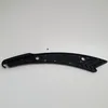 A black plastic part with holes and a curved shape is laid out on a white background. Produktbild-Vorschau