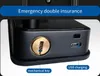 Close-up of a black smart lock showing a mechanical keyhole and a USB charging port. Produktbild-Vorschau