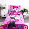 A Disney Minnie Mouse themed bedding set is displayed on a bed. Produktbild-Vorschau