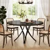 A round dining table with chairs set in a dining room with a large window and curtains. Anteprima dell’immagine prodotto