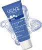 A tube of Uriage baby moisturizing cream is shown against a background of abstract blue line art resembling contour lines. Podgląd zdjęcia produktu