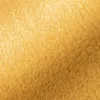 A close-up, textured view of a soft, fuzzy blanket in a mustard yellow color. Voir les images du produit