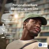 A man wearing headphones in an urban setting, with text overlays describing product features. Voir les images du produit
