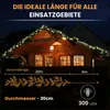 A wooden house decorated with Christmas lights. Produktbild-Vorschau