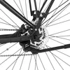 A close-up view of the rear derailleur and disc brake of a bicycle. Produktbild-Vorschau