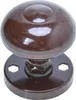 A brown doorknob with a round rosette on a white background. Náhled obrázku produktu