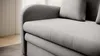 A close-up view of a gray sofa. Produktbild-Vorschau
