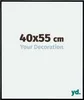 A marketing image showing the dimensions of a picture frame and a placeholder for decoration. Produktbild-Vorschau