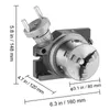 A close-up, angled view of a precision milling machine rotary table with measurement indicators and a three-jaw chuck. Dimensions are indicated with lines and text. Produktbild-Vorschau