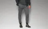 A man wearing athletic pants and a jacket. Produktbild-Vorschau