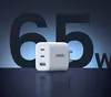 A white Ugreen charger is shown in front of large, dark blue numbers indicating 65W. Podgląd zdjęcia produktu