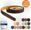 A roll of dark brown flexible PVC trim with adhesive backing, displayed diagonally across a white background. Several circular color swatches are shown in the bottom right corner, representing different available colors. A certification badge is visible in Anteprima dell’immagine prodotto