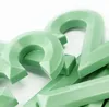 Horloge murale 3D moderne en plastique vert Voir les images du produit 5