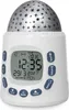 A white digital alarm clock with a star projection dome. Produktbild-Vorschau