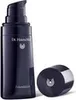 A dark blue bottle of Dr. Hauschka Foundation with its cap off to the side. Voir les images du produit