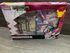 A Pokemon Celebrations Collection: Dark Sylveon V box is displayed on a wooden surface. Produktbild-Vorschau
