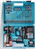 A teal plastic case containing a cordless hammer drill, batteries, charger, and various drill bits and accessories. Produktbild-Vorschau