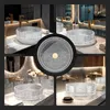 A collage of images showcasing a round glass vessel sink in various bathroom settings. Náhled obrázku produktu