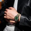 A person wearing a black leather jacket and a white shirt, showing off a watch on their wrist. Voir les images du produit