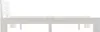 A side view of a white wooden bed frame. Produktbild-Vorschau