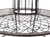 Close-up view of the intricate metalwork of a round garden bench. Náhled obrázku produktu
