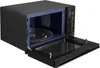 A black Samsung microwave with the door open, showing the blue interior and a glass turntable. Voir les images du produit