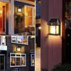 Collage of images showing outdoor wall lights installed on houses. Anteprima dell’immagine prodotto
