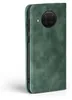 A green flip cover phone case is shown against a white background. Produktbild-Vorschau