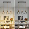 A split image showing a dining room chandelier in two lighting conditions, with text overlays indicating 'ON' and 'OFF'. Anteprima dell’immagine prodotto