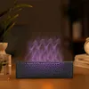 A crackle-finish diffuser with purple flame-like mist sits on a wooden table next to a glass of water and a plant. Náhled obrázku produktu