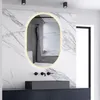 A modern bathroom with a marble wall, a vanity with a dark countertop and sink, and an oval LED mirror. Produktbild-Vorschau