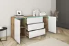 A modern sideboard with drawers and doors, illuminated by LED lights, in a room with wooden flooring. Produktbild-Vorschau
