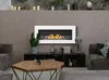 A modern living room with a fireplace, coffee table, and seating. Anteprima dell’immagine prodotto