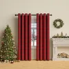 A festive Christmas scene with a decorated tree, plaid curtains, and a fireplace. Produktbild-Vorschau
