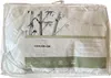 A duvet packaged in a clear plastic bag with a label showing product details and bamboo imagery. Produktbild-Vorschau