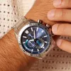 A close-up shot of a man's wrist wearing a blue Casio Edifice watch. Podgląd zdjęcia produktu