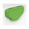 A close-up of a green plastic latch on a white surface. Produktbild-Vorschau