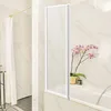 A bathroom scene with a bathtub and a shower screen. Anteprima dell’immagine prodotto