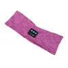 A close-up, angled shot of a purple and pink heathered fabric headband with a small black control module attached. Náhled obrázku produktu