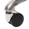 A close-up view of a caster wheel on a chair leg. Náhled obrázku produktu
